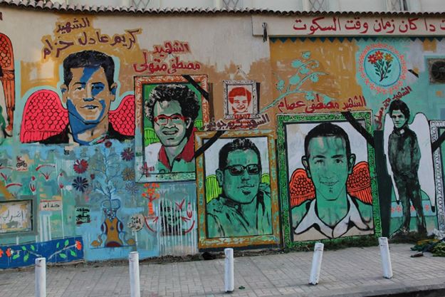 The metaphoric Tomb of Tahrir Square: Angelic portraits of young victims of the Port Said tragedy. Cairo, February 2012.